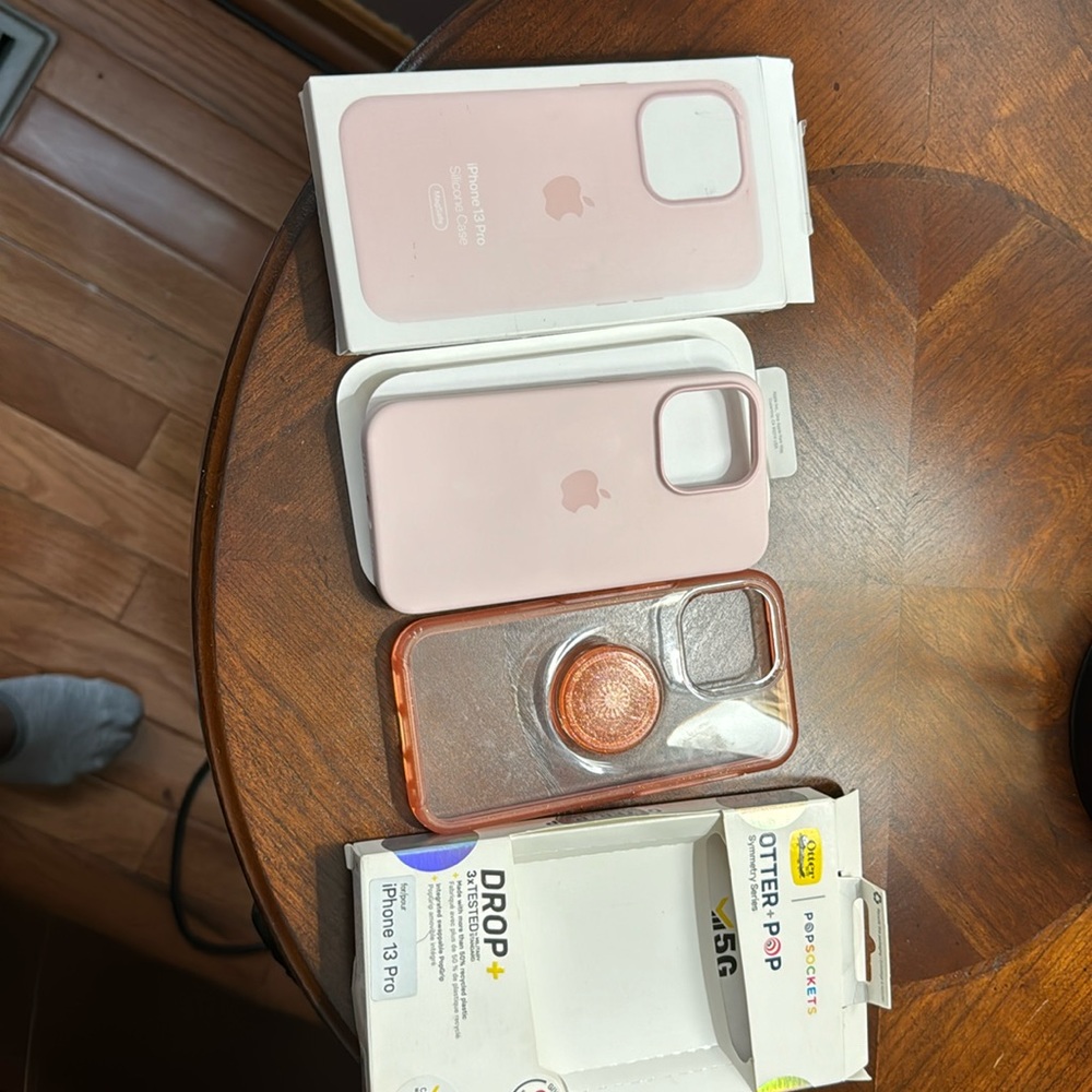 Apple iPhone 13 Pro silicone pink & Otterbox pop clear and orange.